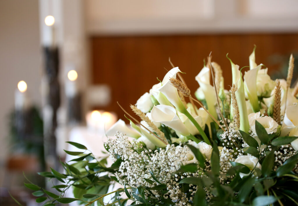 Flowers and candles at a funeral